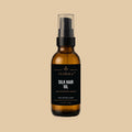 Silk Hair Oil by Florika — amber glass bottle with pump, frizz control and shine