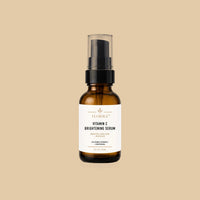 Vitamin C Brightening Serum by Florika — amber glass bottle with pump, stable vitamin C and panthenol